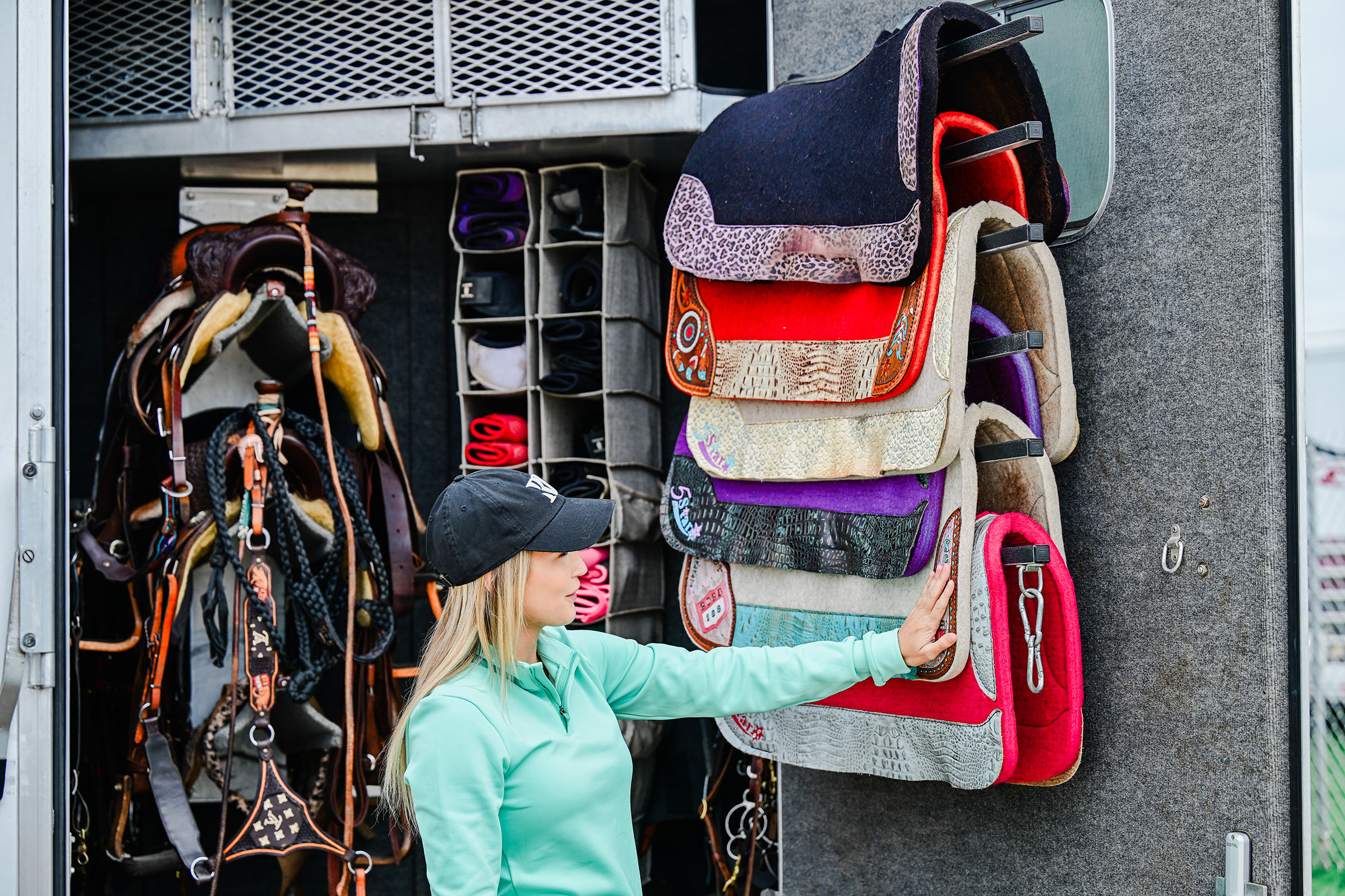 proper way to store a wool saddle pad on a rack to maintain its shape and airflow