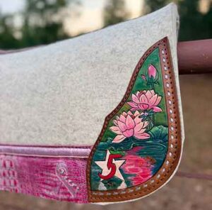 Hand painted water lily leather detail on custom 5 Star saddle pad